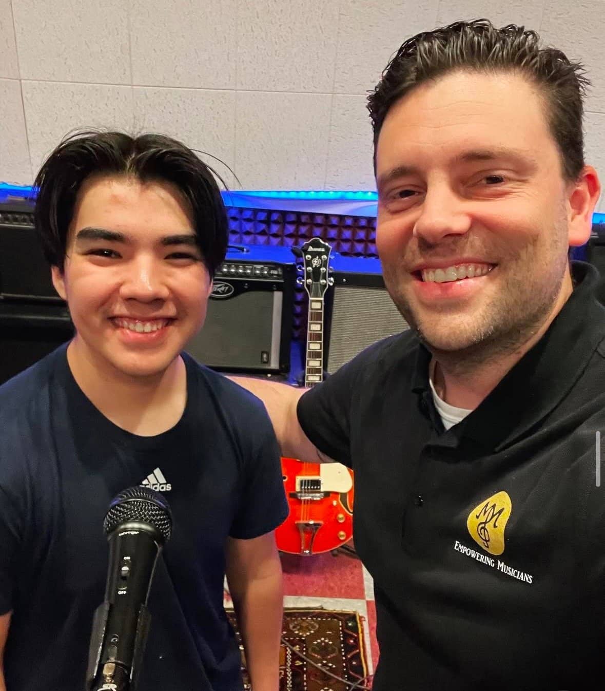 Michael Mingoia with a student at the M3 Studios professional recording room in Patchogue, NY